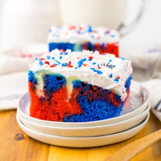 A slice of red, white and blue cake on a plate.