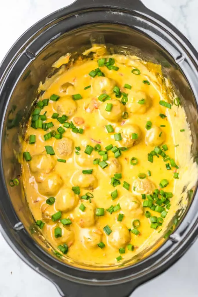 Easy slow cooker meatballs and cheese dip.