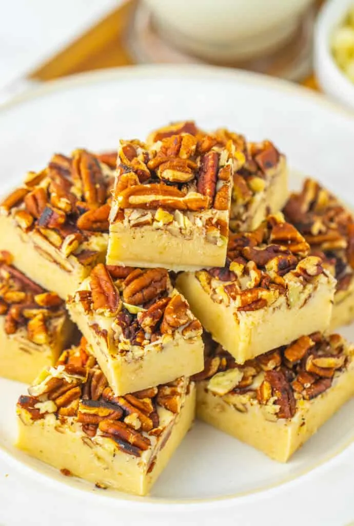 Butter pecan fudge with chopped pecans on top.