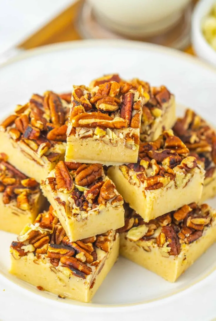Butter pecan fudge with chopped pecans on top.