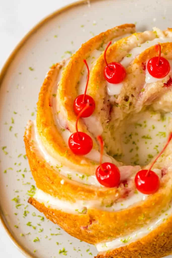 Bundt cake with cherries and whipped cream, delicious dessert recipe