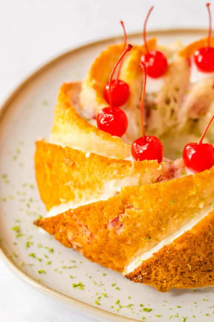 Shirley Temple Cake with cherry topping, festive dessert for celebrations.