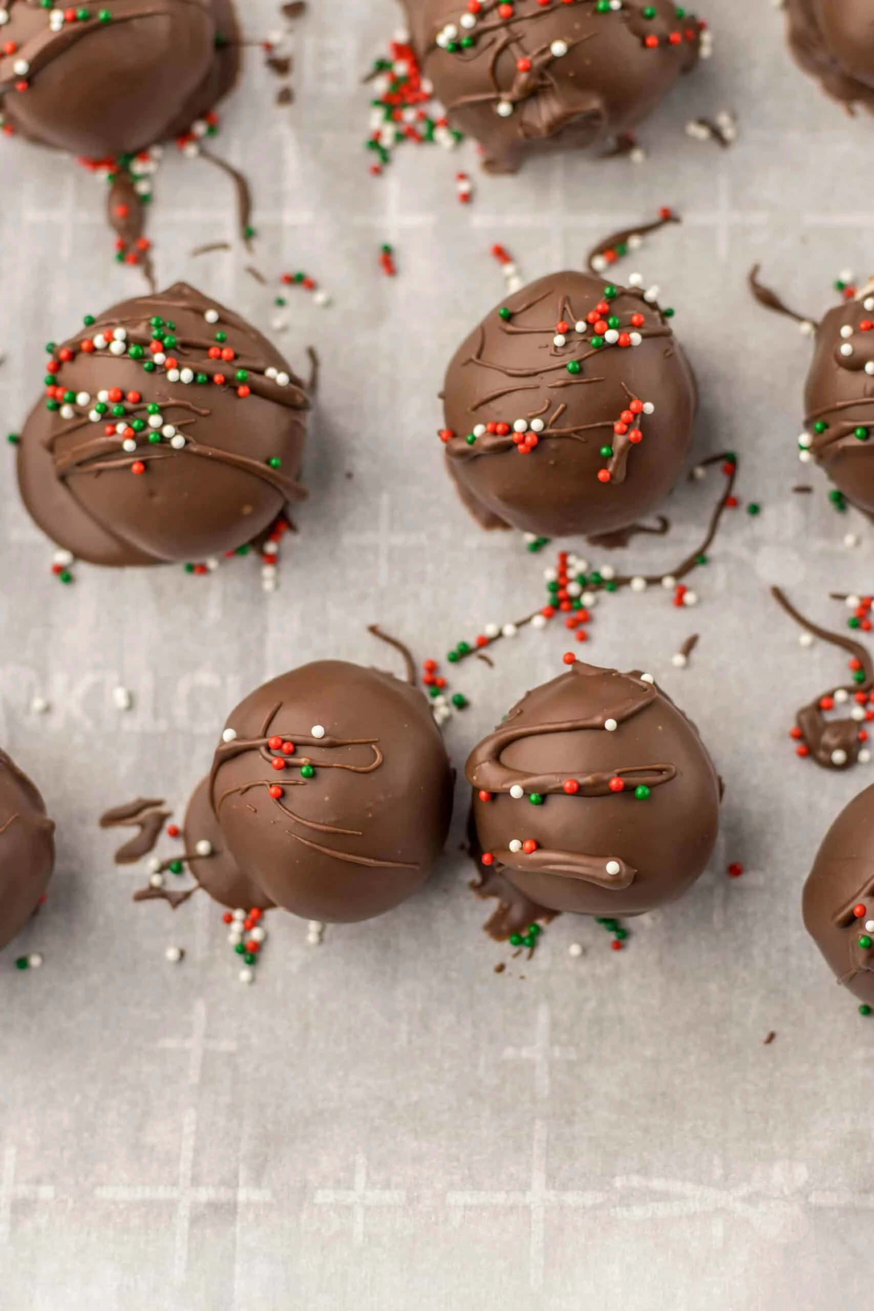 cover chocolate truffles with sprinkles