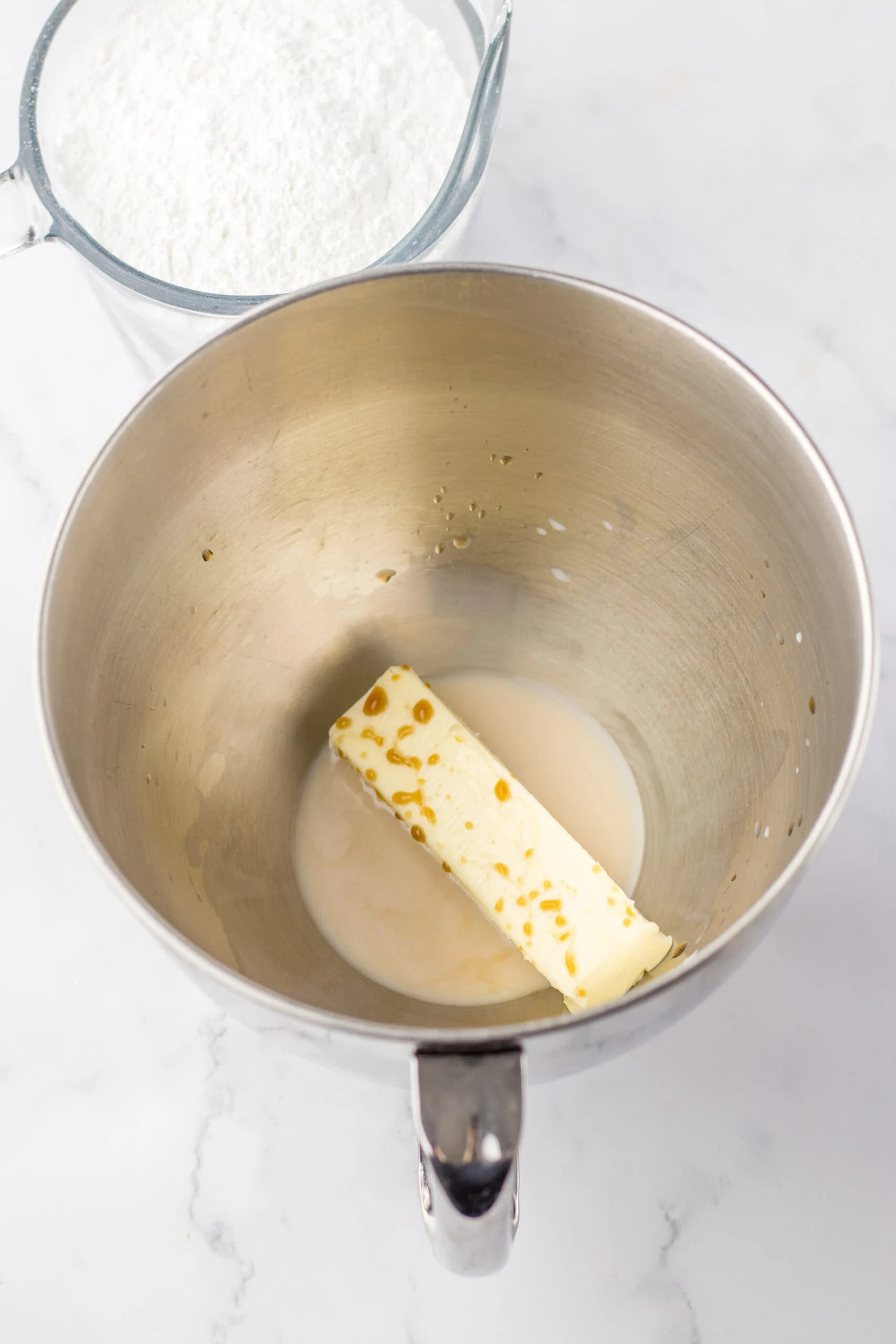 combine butter and sugar in bowl