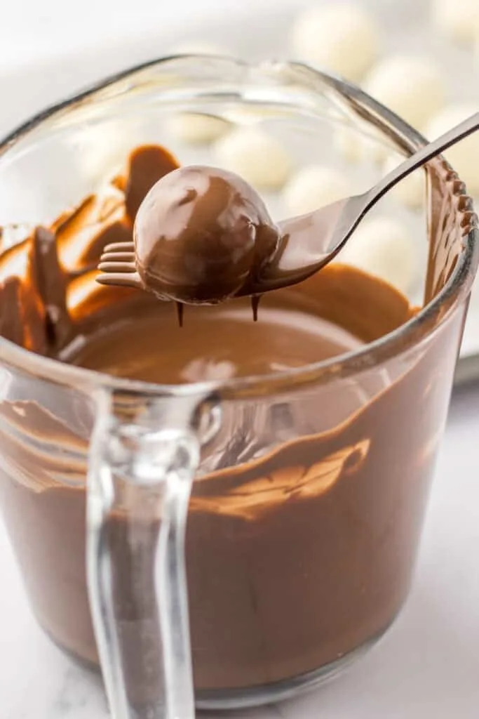 dip refrigerated truffles in chocolate