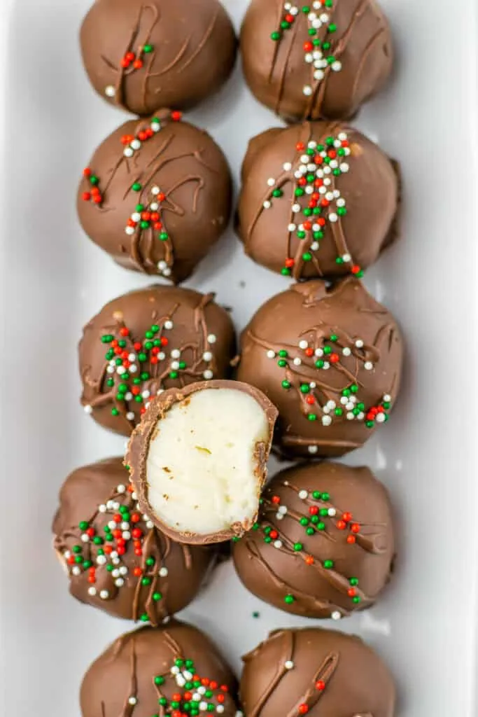 buttercream truffles on white platter