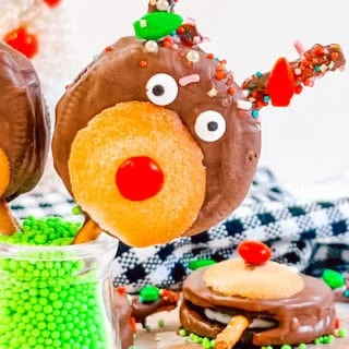 Festive reindeer with chocolate coating, candy eyes, and sprinkles for holiday baking.