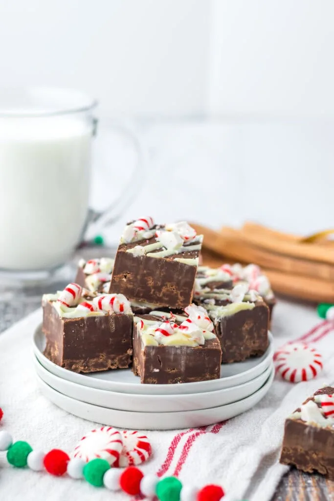 Peppermint fudge on plate with glass of milk