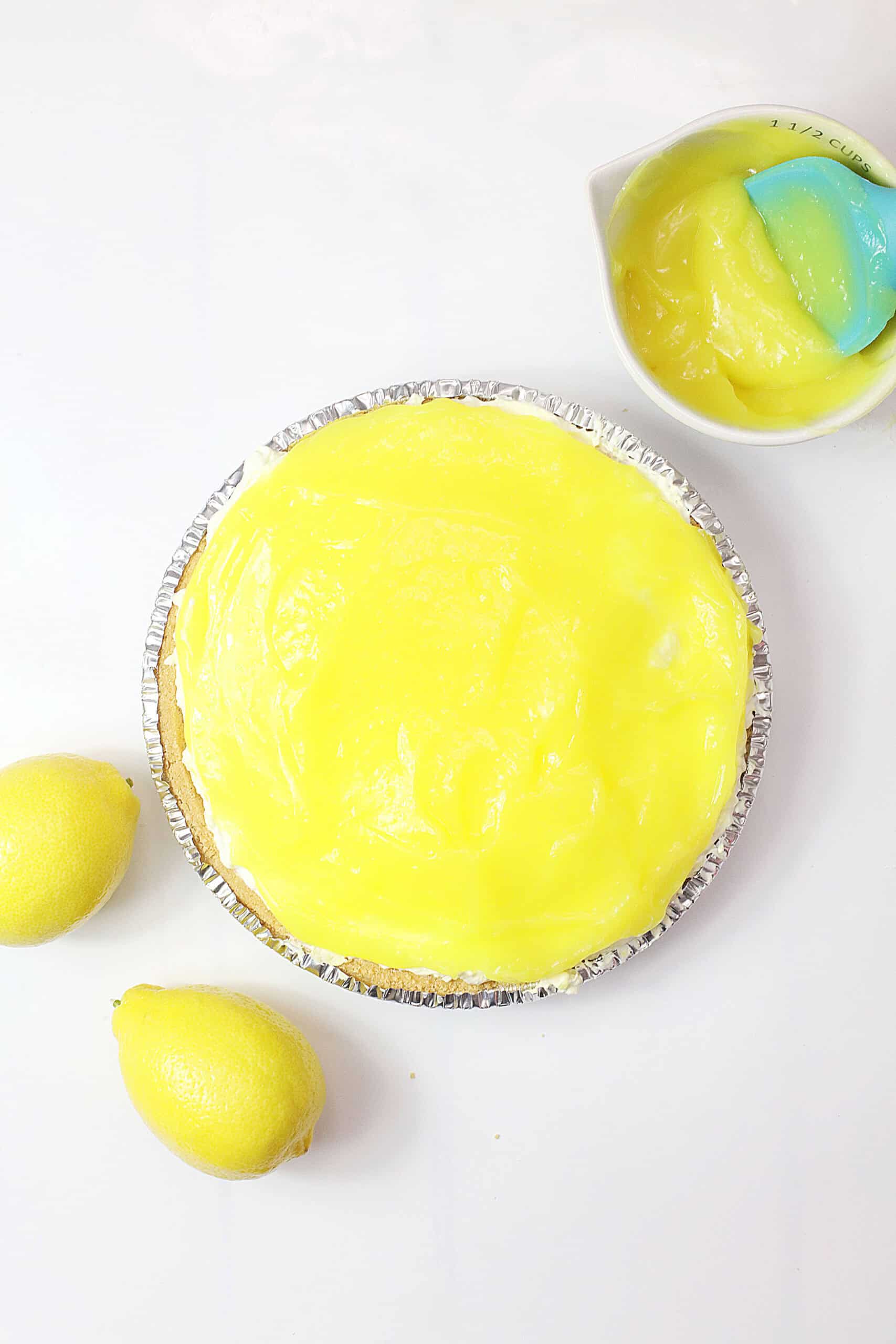 Limoncello Cream Cheese Pie with lemon and colorful topping in foil pan.