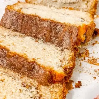 Rich, moist Amish Cinnamon Bread with a golden crust and tender crumb, perfect for breakfast or snacks.