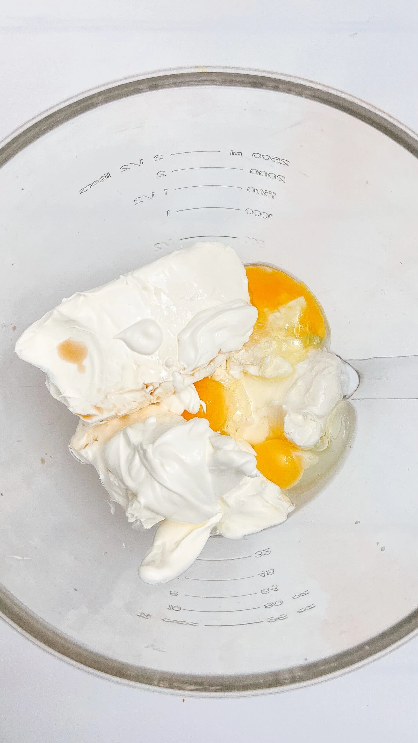 Blended cream cheese and eggs, perfect for cheesecake