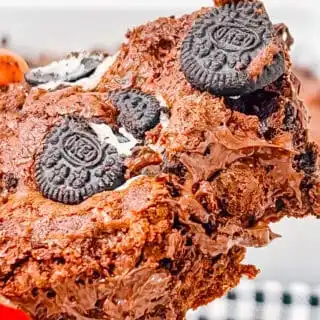 Oreo cookies and rich chocolate brownie close-up photo, perfect for dessert recipes and baking ideas.