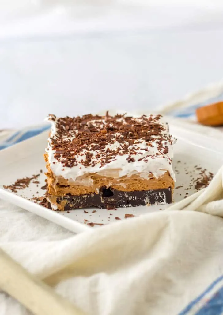 French Silk Brownies served on white platter white napkin