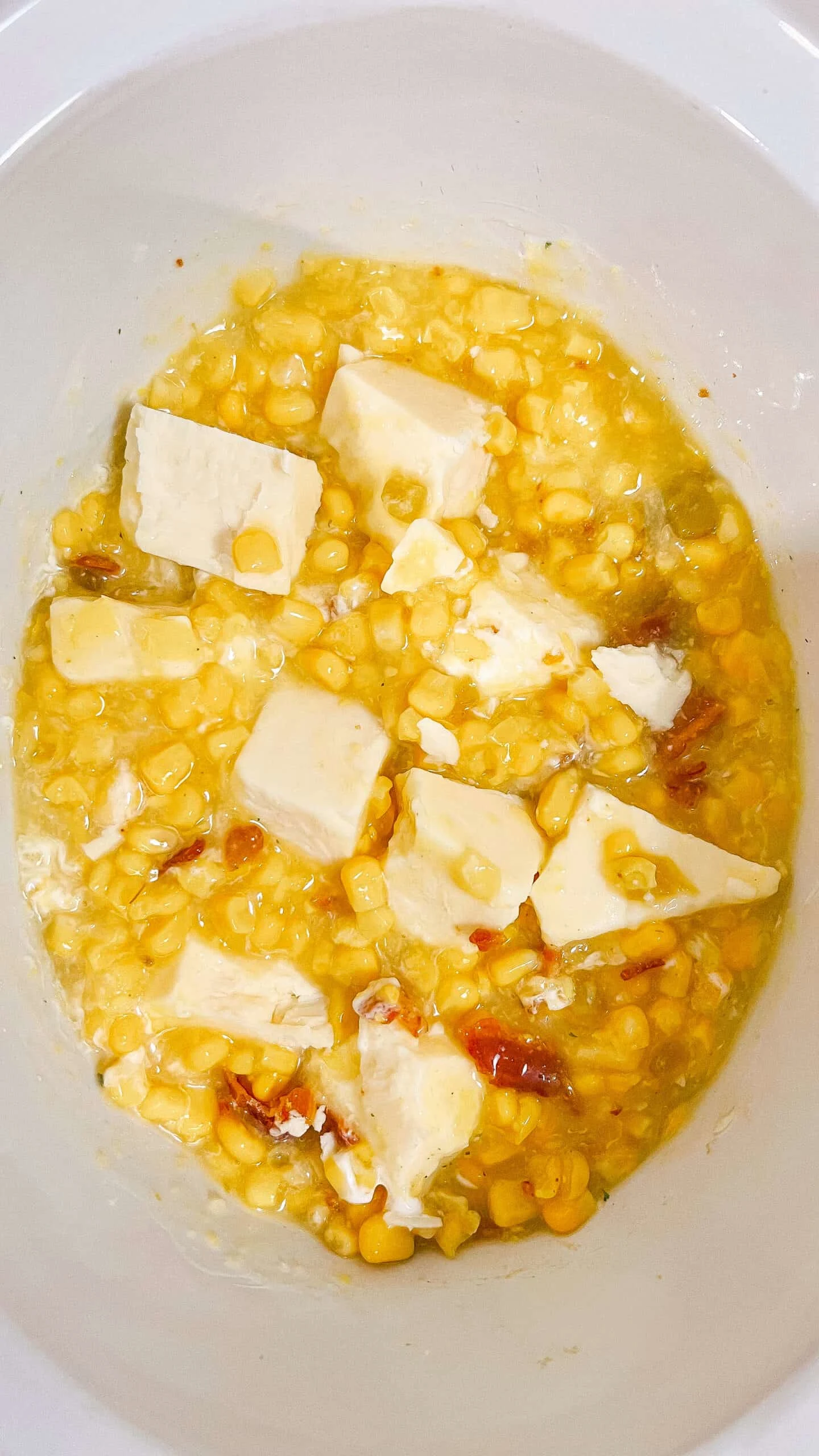 corn dip cooking in crockpot