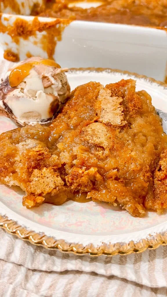 serving cobbler with ice cream on bowl