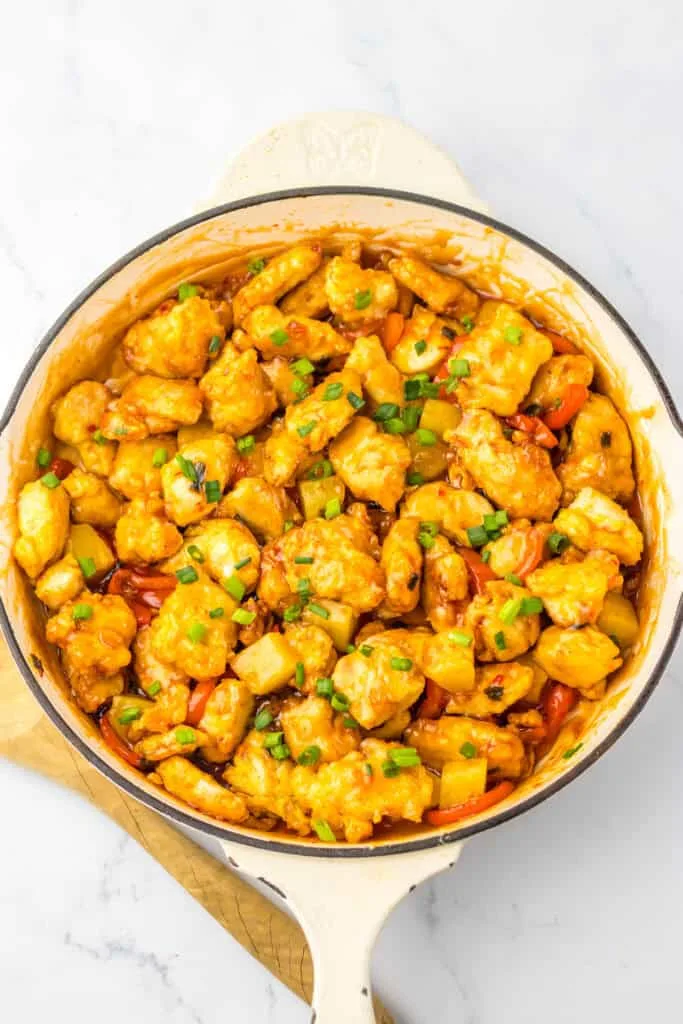 sweet chili chicken and veggies in pan