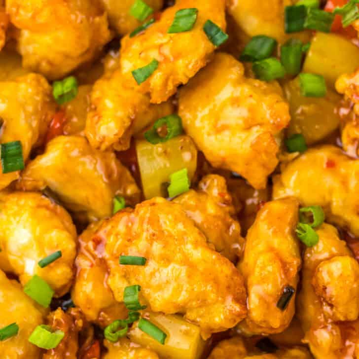 Sweet Chili Chicken with vibrant vegetables and crispy coating. Perfect for quick, flavorful meals.