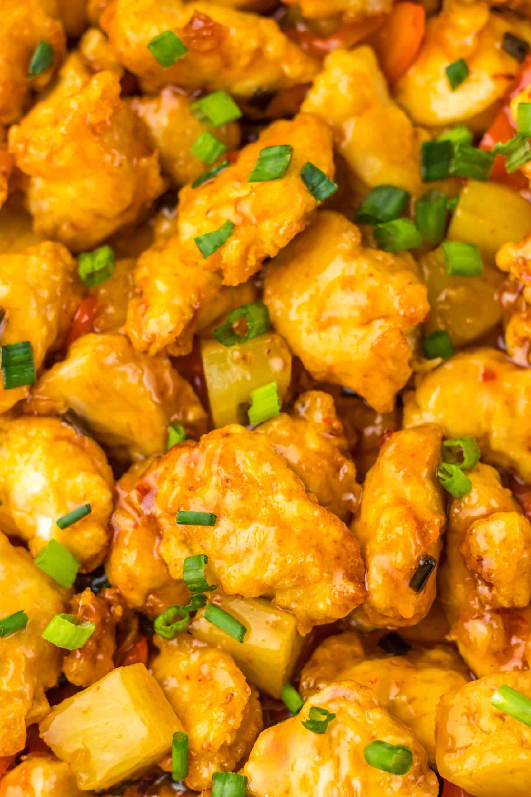 Sweet Chili Chicken with vibrant vegetables and crispy coating. Perfect for quick, flavorful meals.