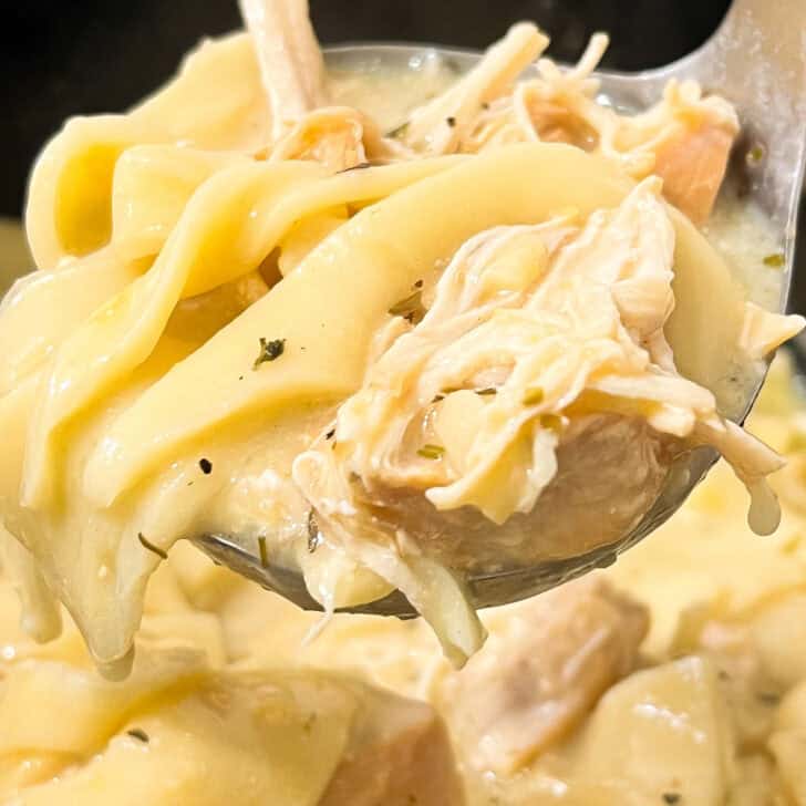 Creamy Crockpot Chicken Alfredo Lasagna Soup with tender chicken and pasta. Perfect comfort food for.