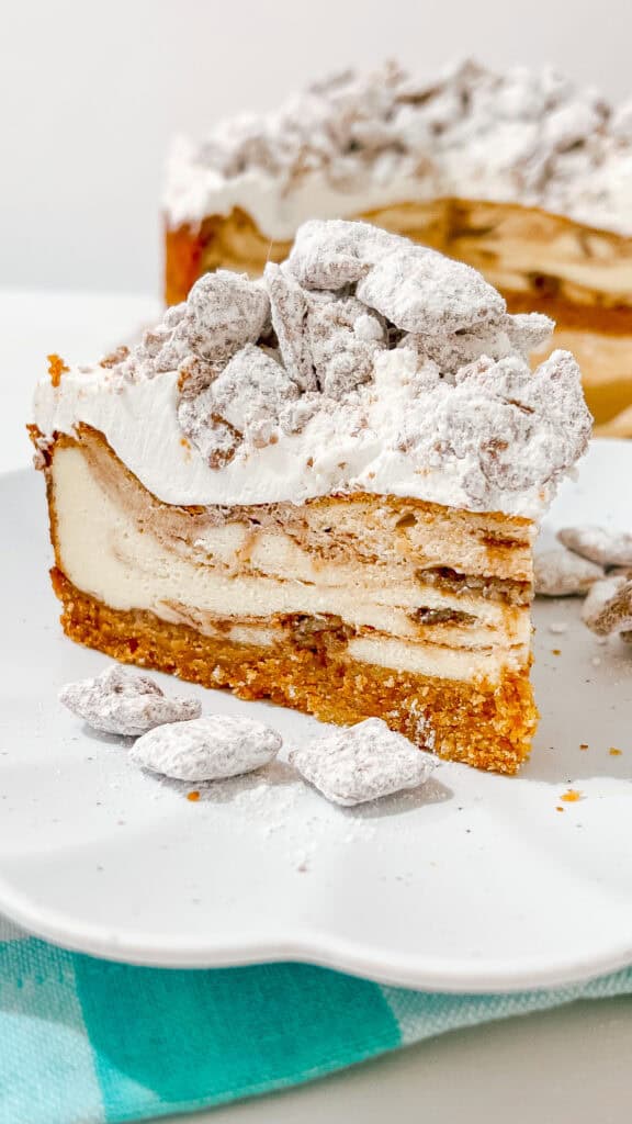 Satisfy your sweet tooth with Muddy Buddy Cheesecake, featuring layers of chocolate, peanut butter, and crunchy Muddy Buddy pieces.