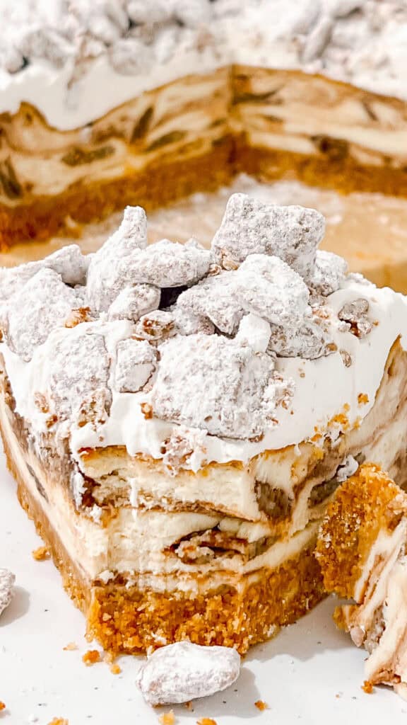 Satisfy your sweet tooth with Muddy Buddy Cheesecake, featuring layers of chocolate, peanut butter, and crunchy Muddy Buddy pieces.