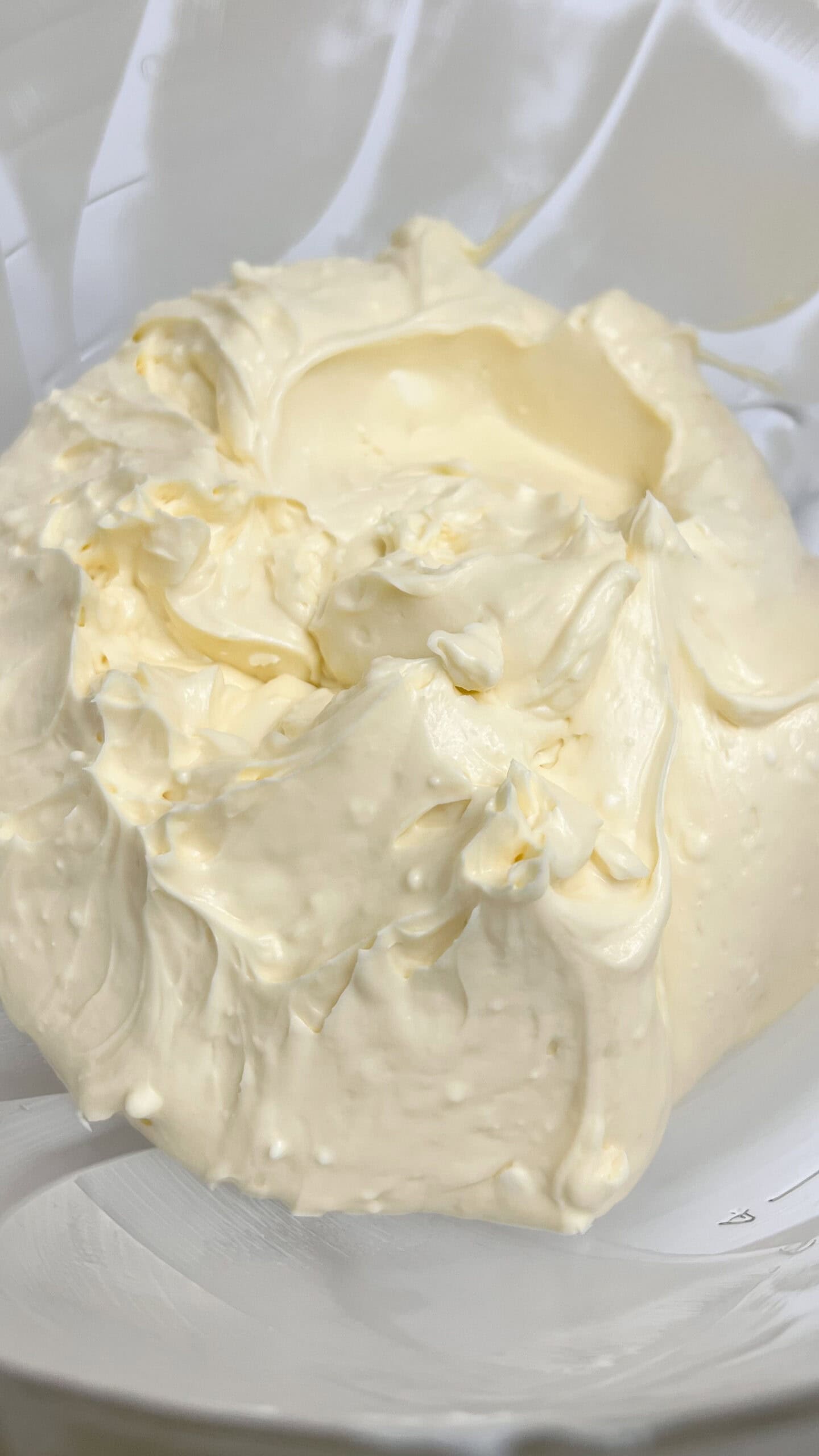 Creamy lemon cheesecake with crumb topping, bakery-style dessert.