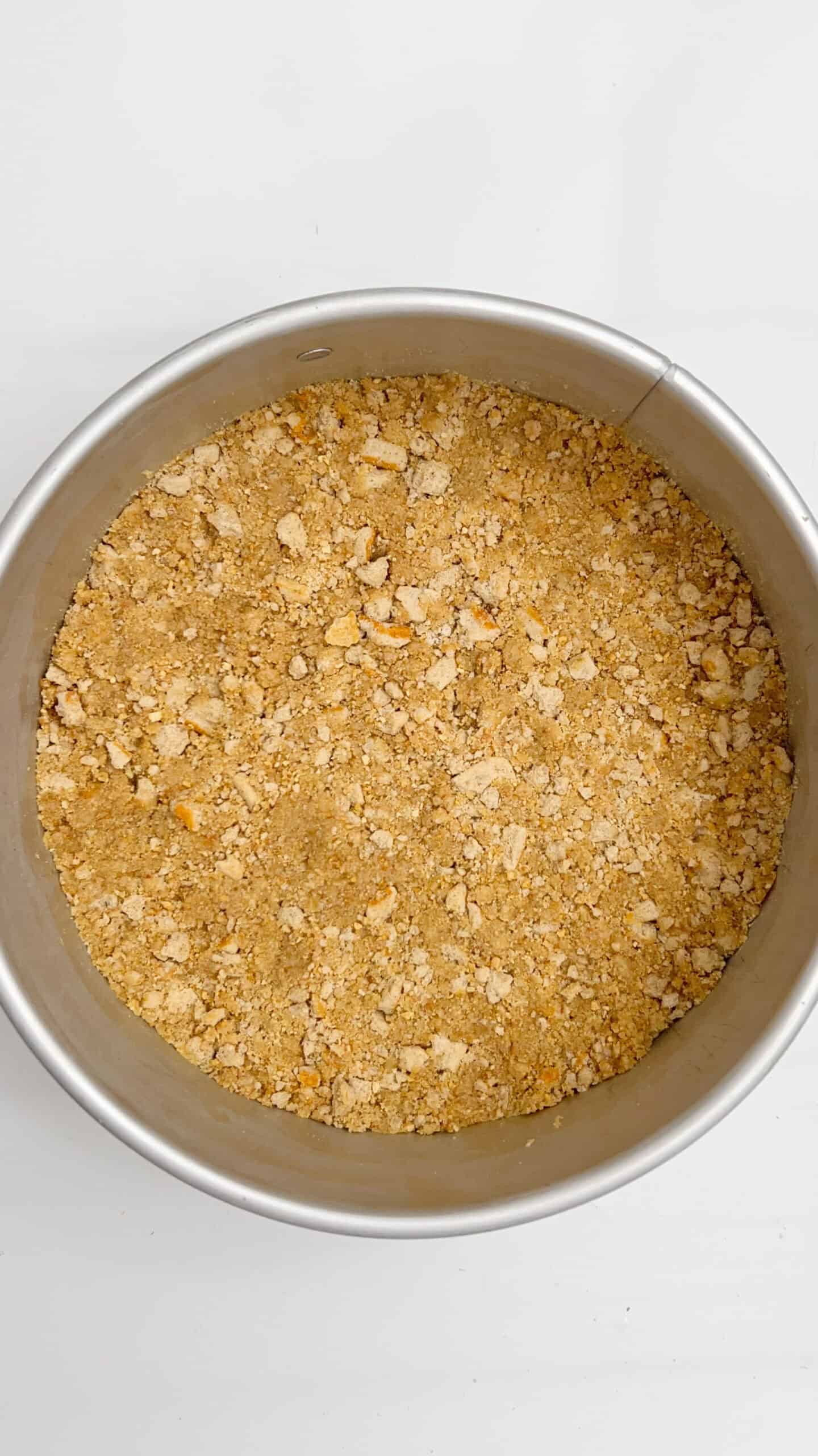 Crumb topping for Lemon Cream Cheesecake in a round pan.