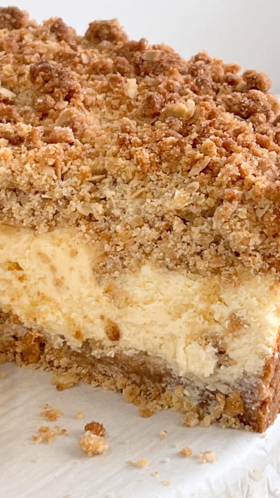 Delicious lemon cream crumb cheesecake with thick bakery-style crust.