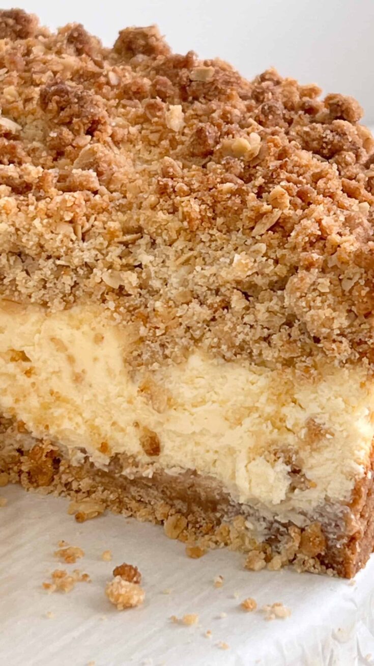 Delicious lemon cream crumb cheesecake with thick bakery-style crust.
