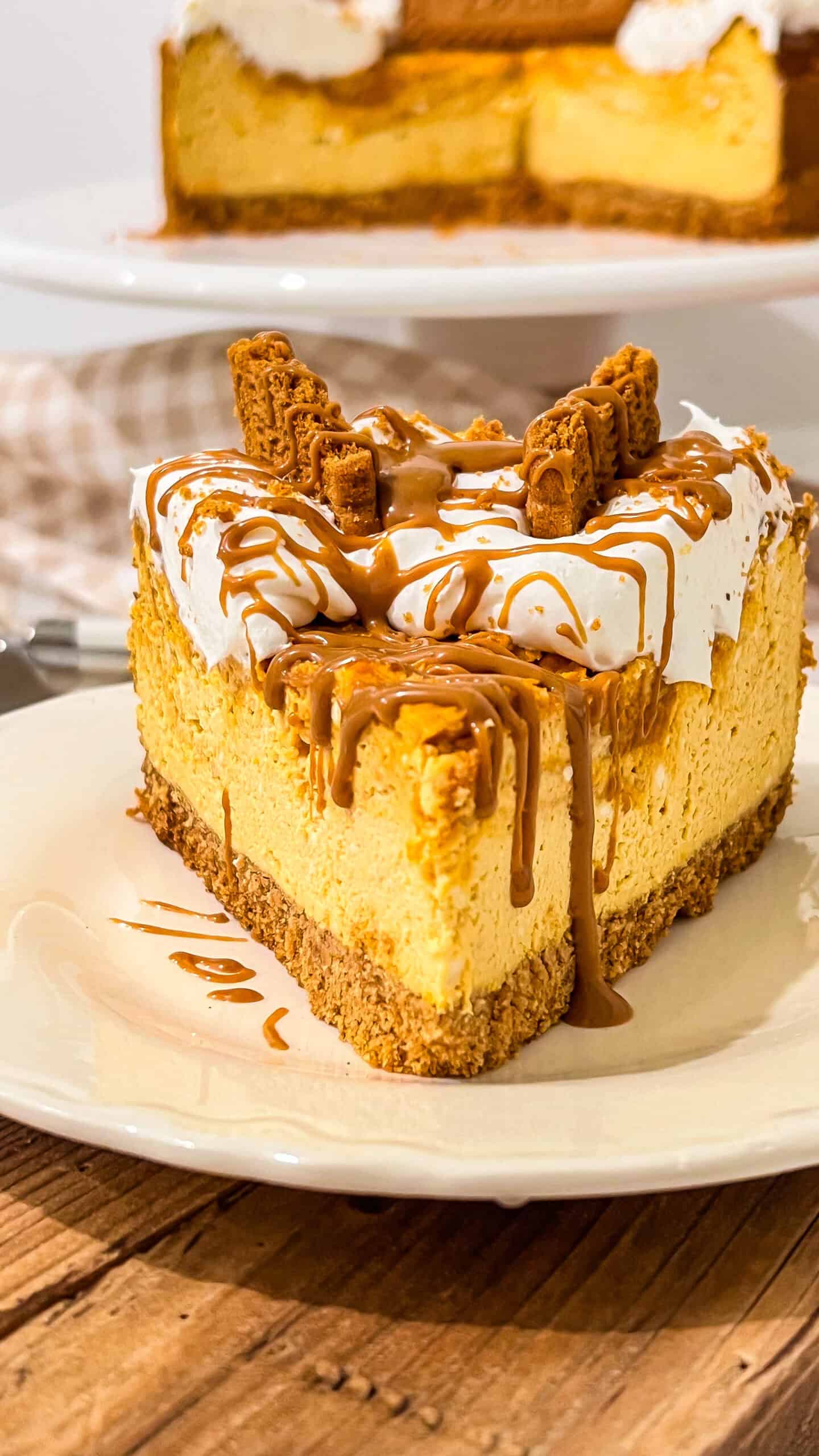 This Pumpkin Biscoff Cheesecake is the ultimate fall dessert! Rich, creamy pumpkin cheesecake meets a buttery Biscoff cookie crust and warm pumpkin pie spices for an irresistible combination of flavors. Perfect for Thanksgiving, Christmas, holiday parties, or any fall gathering! If you love pumpkin desserts and Biscoff cookies, this decadent cheesecake recipe is a must-try! #PumpkinBiscoffCheesecake #PumpkinCheesecake #BiscoffDesserts #ThanksgivingDesserts #FallDesserts #CheesecakeRecipes via @Mooreorlesscook